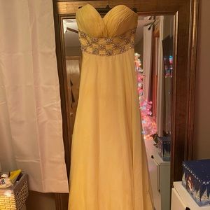 Yellow strapless beaded prom dress